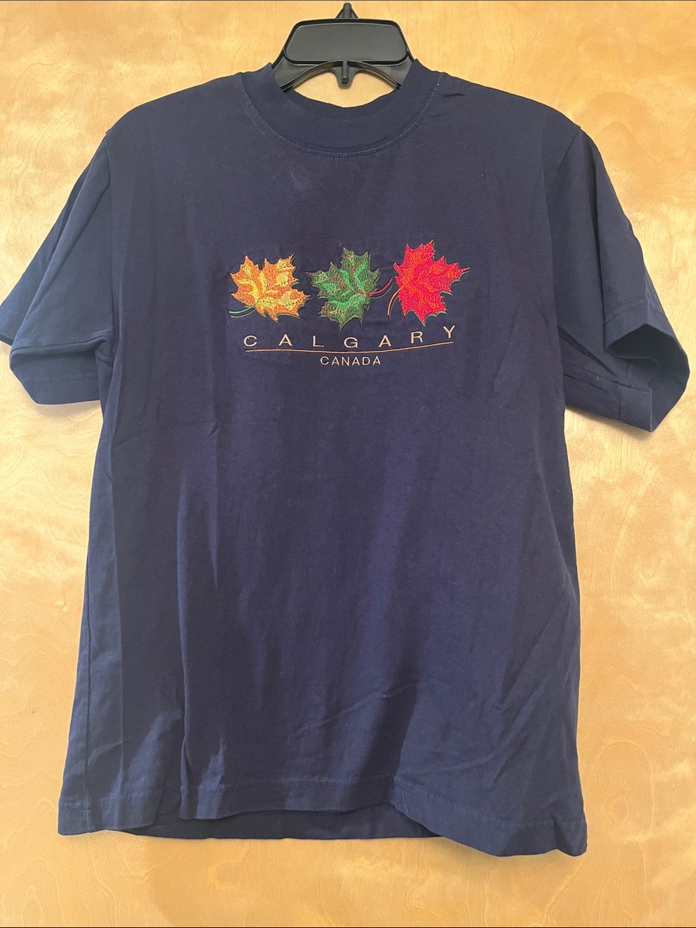 Calgary Canada Navy Short-Sleeve Tee with Multicolor Maple Leaf Embroidery